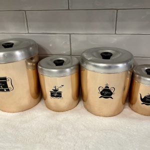 Vintage West Bend copper-look aluminum canister set. Rose gold Retro Kitchen Storage